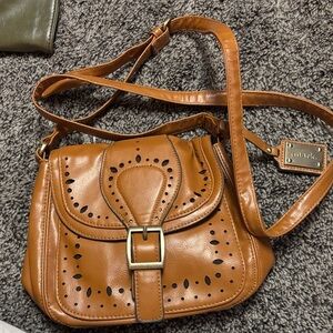 mark. Tan Leather Crossbody Bag with Cut-Out Design